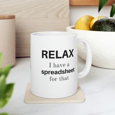 a coffee mug that says relax i have a spreadsheet for that