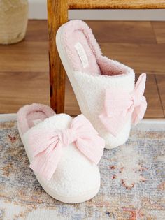 These slippers are the perfect companion for cozy nights in. The oversized bow adds a touch of playful charm, a reminder to embrace the little joys in life. The luxuriously soft material feels like walking on clouds. Pink Cloud Slippers, Cute House Slippers Woman, Comfy Slippers Aesthetic, Pink Girly Christmas Wishlist, Girly Sneakers Outfit, Cute Preppy Stuff, Gifts Under $50, Cute Slippers Aesthetic, Young Adult Gifts