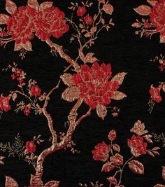 a black background with red flowers and leaves