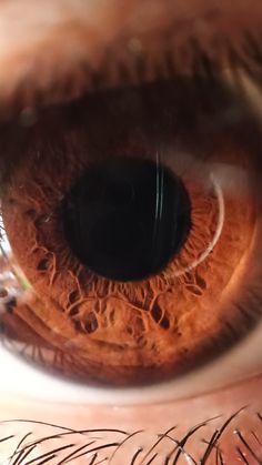 an extreme close up shot of the iris of a person's eye