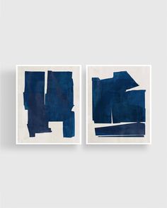 two blue abstract paintings on white paper