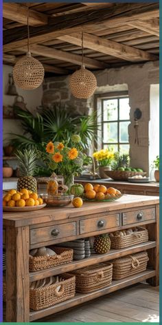 an old wooden table with baskets and fruit on it in a rustic style kitchen area