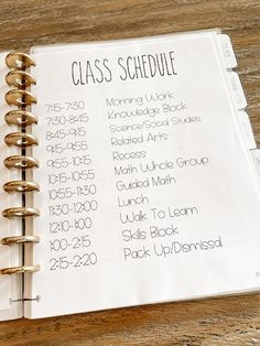 a close up of a book on a table with many things to do in the class schedule