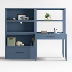 a blue bookcase with two drawers and a plant on top is shown in front of a white background