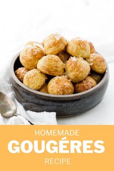 homemade gougeres recipe in a bowl with spoons and napkin on the side