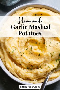 homemade garlic mashed potatoes in a white bowl with a spoon on the side and text overlay