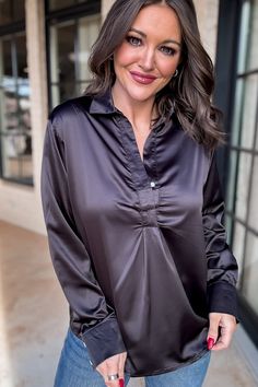 Experience the perfect combination of comfort and sophistication with this Chic Certainty satin black blouse. The collared design and loose fit ensure an effortless look that will fill you with confidence. Put on this blouse and feel the certainty of chic! Fit: She is wearing her true size medium. Fits true to size. If in between sizes, size down. Madeleine, Satin Black Blouse, Satin Clothes, Effortless Look, Princess Madeleine, Satin Blouse, Size 00, Black Blouse, Silk Satin