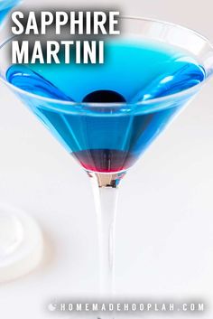 blue liquid in a martini glass with the words sapphire martini above it and below it