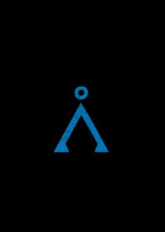 a blue triangle on a black background with the letter a in it's center