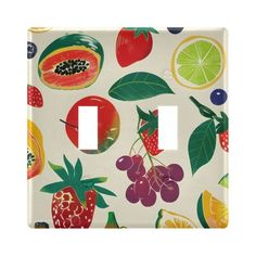 a light switch cover with fruit on it