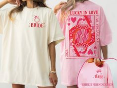 two women wearing matching t - shirts that say, lucky in love and babe's friend design