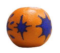 an orange with blue splatches on it