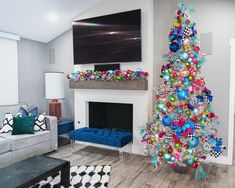 a brightly colored christmas tree in a living room