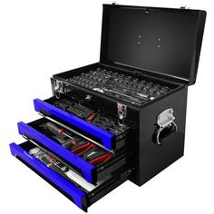 an open tool box with three drawers