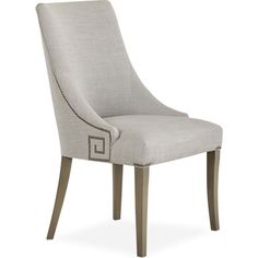 an upholstered dining chair with wooden legs and fabric seat padding, made in the usa