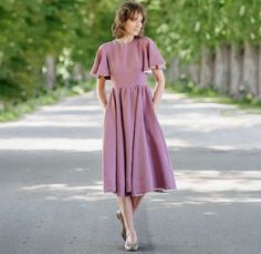 PURPLE LINEN DRESS | Mid Century Modern, Butterfly Sleeve Dress 🌸Made of 100% already softened linen, our Butterfly Sleeve Dress was created to beautifully fit all body types. Its humble collar and butterfly sleeves create a timeless expression of style and elegance. Closed with one button on the back and a zip on the side, this charming Short Sleeve Maxi Dress can be put on and off with ease. ♡Join our Newsletter Community and receive 10% off your first purchase! Sign up here: https://tinyurl.com/2vdrvbr6 🌸Features: ✔The Butterfly Sleeve Dress is Made of 100% already softened linen. ✔This Butterfly Sleeve Dress is perfect for parties, weddings, and everyday use. ✔Its humble collar and butterfly sleeves create a timeless expression of style and elegance. ✔These authentic details add a ro Purple Holiday Dress, Purple Linen Dress, Maxi Linen Dress, Purple Linen, Butterfly Sleeve Dress, Formal Dresses With Sleeves, New Years Outfit, Butterfly Sleeve, Short Sleeve Maxi Dresses