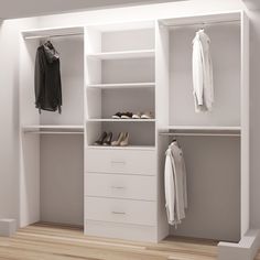 an empty white closet with shoes and clothes