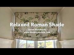 a window with the words relaxed roman shade in front of it and an image of flowers on