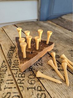 a set of wooden pegs sitting on top of a table