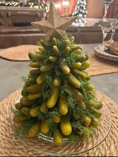 a small christmas tree made out of gourds