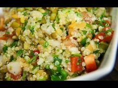 a white bowl filled with lots of food