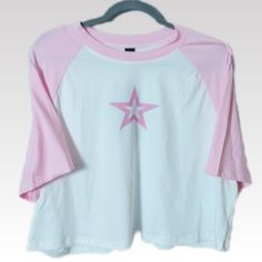 This Pink And White Graphic T-Shirt In Womens Plus Size 4xl Is New With Tags! This Cropped Crew Neck Short Sleeve Top Features A Front Graphic Logo Displaying A Pink Hollowed Out Star. A Great Addition To Your On The Go T-Shirt Collection. Features A Baseball Style Cut With Short Raglan Sleeves. Top Is Made Of A Stretch Knit And Oversized For Added Comfort... *Measurements & Details: Bust/Chest (Ptp): 25" Length: 19" Color: Pink/White Material: 95% Polyester / 5% Spandex *Measurements Are Approx Baggy Pink Shirt, Cutecore Shirt, Oversized Crop Top Outfit, First Day Of School Fits, Baseball Tee Shirts, School Fit, Pink Crop Top, Graphic Logo, Storage Hacks