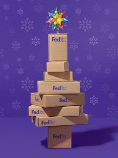 a stack of fedex boxes stacked on top of each other