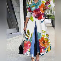 Make A Statement In This Stunning Women's Casual Button Down Long Sleeve Maxi Shirt Dress. Featuring A Vibrant Orange, Purple, And Blue Feel Confident And Comfortable With This Stunning Floral Maxi Dress. The Loose Fit And Lightweight Fabric Make It Perfect For Any Occasion, While The Vibrant Colors And Beautiful Floral Print Add A Touch Of Elegance. Whether You're Headed To A Beach Party Or A Casual Day Out, This Dress Is Sure To Turn Heads. Casual Loose Fit Floral Print Long Sleeves Button Down Split Hem Ship 5-7 Business Days Women's Floral Long Sleeve Maxi Shirt Dress Casual Loose Button Down Split Beach Dresses. Women S, M, L, Xl, 2xl Orange S Bust 38.7 Length 48.5 M Bust 40 Halter Neck Maxi Dress, Classic Shirt Dress, Striped Maxi Skirts, Maxi Shirts, Dress Shirt Sleeves, Block Dress, Maxi Shirt Dress, Long Shirt Dress, Printed Shirt Dress