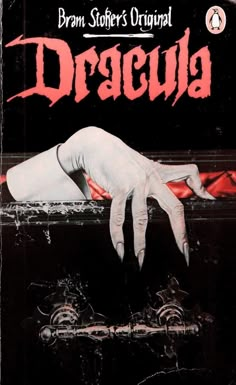 the poster for dracula starring in an old - fashioned horror film, with hands reaching out from