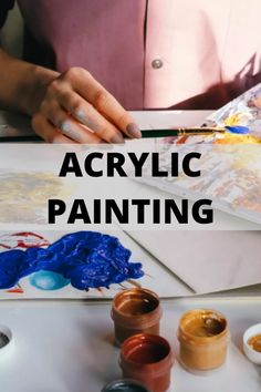 a person is painting with acrylic paint