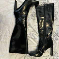 Never Worn Square Toes Black Patent Leather Boots. Zip All The Way Up, Both Work. Definitely For Smaller Calves/Legs. Extremely Cute! Knee-high Polyurethane Boots For Night Out, Party Heeled Boots With Wide Calf, Polyurethane Knee-high Boots With Round Toe For Party, Party Wide Calf Polyurethane Heeled Boots, Faux Leather Fitted Heels With Zipper Closure, Faux Leather Heels With Zipper Closure, Fitted Faux Leather Heels With Zipper Closure, Patent Leather Knee-high Boots For Night Out In Fall, Patent Leather Party Boots With Zipper Closure