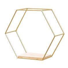 a gold hexagonal shelf with wooden shelves