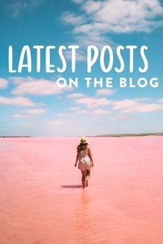 a woman walking across a pink lake with the words latest posts on the blog