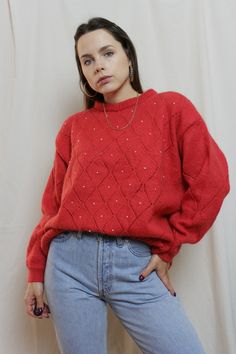 Cute vintage coral red women's sweater. Oversized, warm and comfy. Crew neckline, openwork and pearls in front. Probably handmade.  Material: handmade and no care tag, but it is some wool blend (probably wool + mohair); it is a bit itchy because of wool Overall condition: Perfect 10/10 Size: XL Armpit to armpit: 146 cm / 57,48 inches Length: 61 cm / 24 inches Bottom width: 122 cm / 48 inches Sleeve length: 53 cm / 20,85 inches Armpit seam to cuff seam: 44 cm / 17,3 inches More sweaters and tops Woolen Sweater, Oversize Pullover, Woolen Sweaters, Levis Pants, Perfect 10, Oversized Jumper, Sweater Oversized, Coral Red, Levi Jeans 501