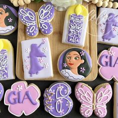 some decorated cookies are sitting on a table