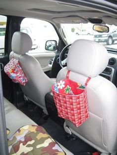 the back seat of a car with a basket in it