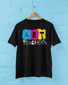 Art Teacher Tshirt, Art Teacher Shirt, Elementary Art Teacher Shirts, Art Teacher Appreciation Gift, Unisex Art Teacher T-shirt, CMYK Shirt.  You've now found the staple t-shirt of your wardrobe. It's made of 100% ring-spun cotton and is soft and comfy. The double stitching on the neckline and sleeves add more durability to what is sure to be a favorite!   * 100% ring-spun cotton * 4.5 oz/yd² (153 g/m²) * Pre-shrunk * Shoulder-to-shoulder taping * Quarter-turned to avoid crease down the center Artistic Short Sleeve T-shirt With Letter Print, Artsy Black Crew Neck T-shirt, Artsy Multicolor Screen Print T-shirt, Graphic Tee T-shirt For Artistic Expression With Custom Artwork, Artistic Custom Print Short Sleeve T-shirt, Artsy Cotton T-shirt With Custom Print, Cotton Art With Graphic Print For Artistic Expression, Artsy Multicolor Screen Print Tops, Artsy Short Sleeve T-shirt With Screen Print