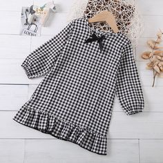 Product Title: Girls Bow Long Sleeve Plaid Casual Dress Girls Dress Keyword Tag: Wholesale Baby Boutique Suppliers Usa* Soft Feeling & Cozy Comfortable* Package Package Included: 1 Top + 1 Pants* Fabric & Fabric: 97% Polyester, 3% Spandex* Available for Machine Wash as well as TumbleDry* Imported * Imported Are you look for a best quality and cheapest dress? Then Girls Bow Long Sleeve Plaid Casual Dress Girls Dress Wholesale is the best one for you! The New style with amazing designs for reflect Long Sleeve Ruffled Dress For School, Long Sleeve Winter School Dress, White Long Sleeve School Dress, Cute Winter Dress For School, Long Sleeve Cotton School Dress, Black School Dresses For Fall, Black Dresses For School In Fall, Black Fall Dresses For School, Casual Winter School Dress