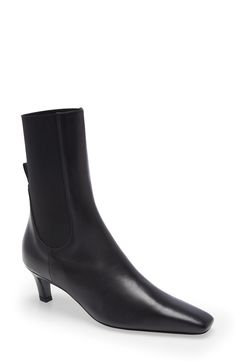 An elongated shaft with stretchy elastic panels accentuates the modern look of a sleek ankle boot featuring a low heel and Totême's signature square toe. 2 1/4" (60mm) heel Pull-on style Leather and textile upper/leather lining and sole Made in Italy SPACE: A shop for emerging and advanced designers S Signature, Mid Heel, Boot Shoes Women, Low Heels, Bootie, Chelsea Boots, The Modern, Ankle Boot, Shoe Boots