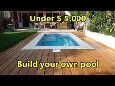 a wooden deck with a swimming pool in the middle and an advertisement on it that says under 4, 500 euros