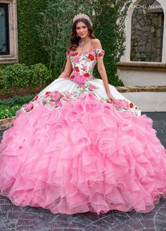 Look breathtaking in this floral applique long sweetheart dress with A-line ruffled skirt by Rachel Allan RQ5007. This quinceañera gown is a vibrant spectacle of color and grandeur. The gown features a stunning contrast of color with a beautifully embroidered bodice that includes floral motifs in vivid hues. The off-the-shoulder neckline adds a classic and elegant touch, while the voluminous skirt is crafted from layers of cascading ruffles, creating a dramatic and eye-catching effect. This dres Dama Dresses Quinceanera, 1500 Dresses, Quince Dresses Charro, Mexican Quinceanera Dresses, Charro Quinceanera Dresses, Quinceñera Dresses, Dama Dresses, Pretty Quinceanera Dresses, Military Ball Dresses