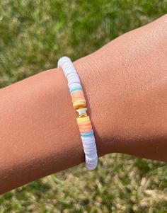 This is a bracelet made with clay beads to look like a fading sunrise with a star in the center. Pick from 3 sizes and add this cute bracelet to your collection. Star Bracelets, Bracelet Inspo, Cute Bracelet, Yellow Star, Clay Bracelet, Beads Bracelets, A Bracelet, Star Bracelet, Cute Bracelets