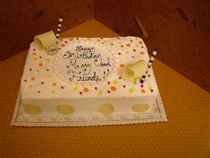 a birthday cake with candles and decorations on it