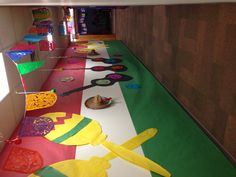 an office hallway decorated with colorful paper decorations