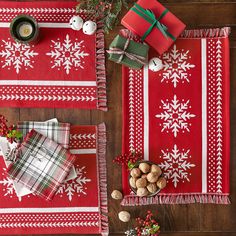 red and white placemats with snowflakes on them next to christmas decorations