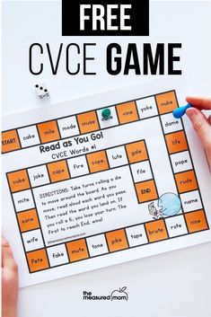 a hand holding up a game board with the words cvoe game on it and an image