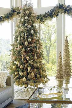 a decorated christmas tree in a living room