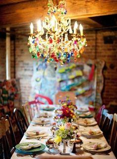 an image of a dining room table with plates and place settings on the table for dinner