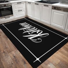 a kitchen area rug with the word hello written on it in cursive font