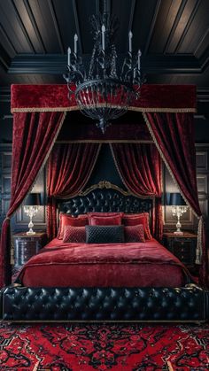 a bed with a red velvet canopy and black leather headboard, chandelier and pillows